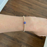 Beaded Ball Bracelet With Dangling Evil Eye